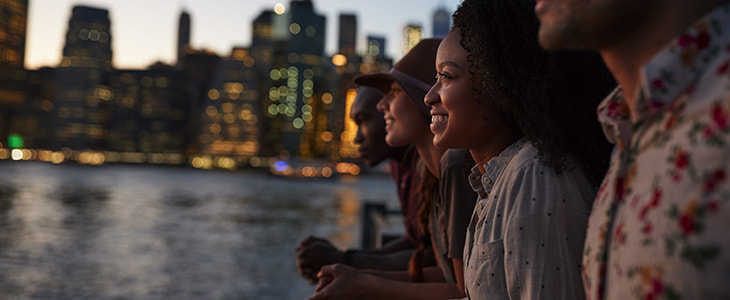 NYC tourists look out over the skyline