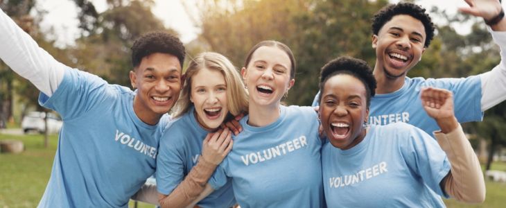 a group of volunteers smile
