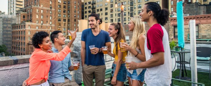 friends gather at a new york city brewery