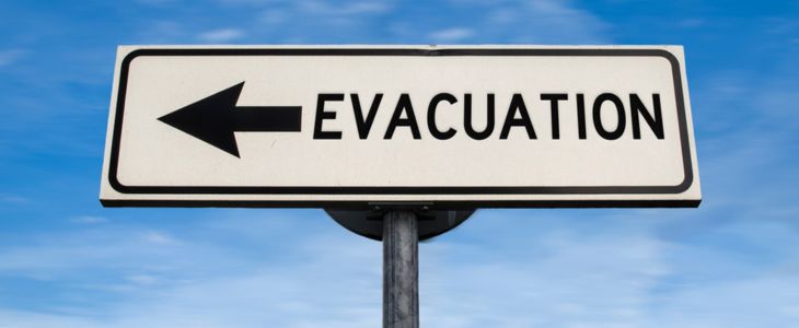 An emergency evacuation route road sign